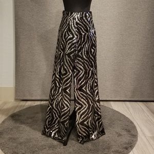 Black and silver sequins pants.